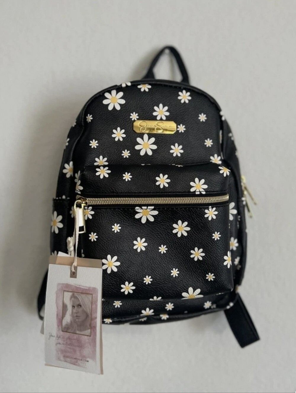 NWT-Jessica Simpson Black Daisy Mini Backpack W/ Gold Hardware Plus 2 Charms.